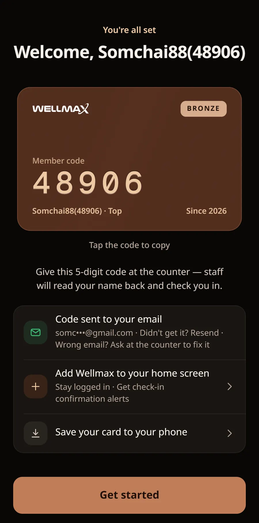 The Wellmax game app showing a new member's card with the five-digit member code 48906 and a Bronze tier badge
