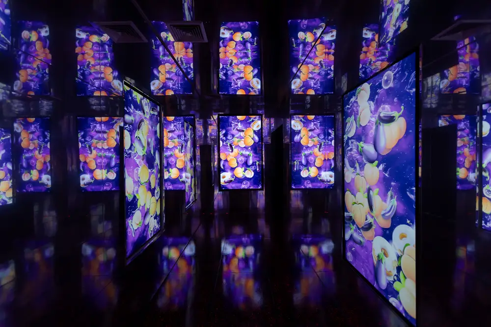The infinity Hall of Mirrors with rotating projected digital art at Wellmax, Bangkok